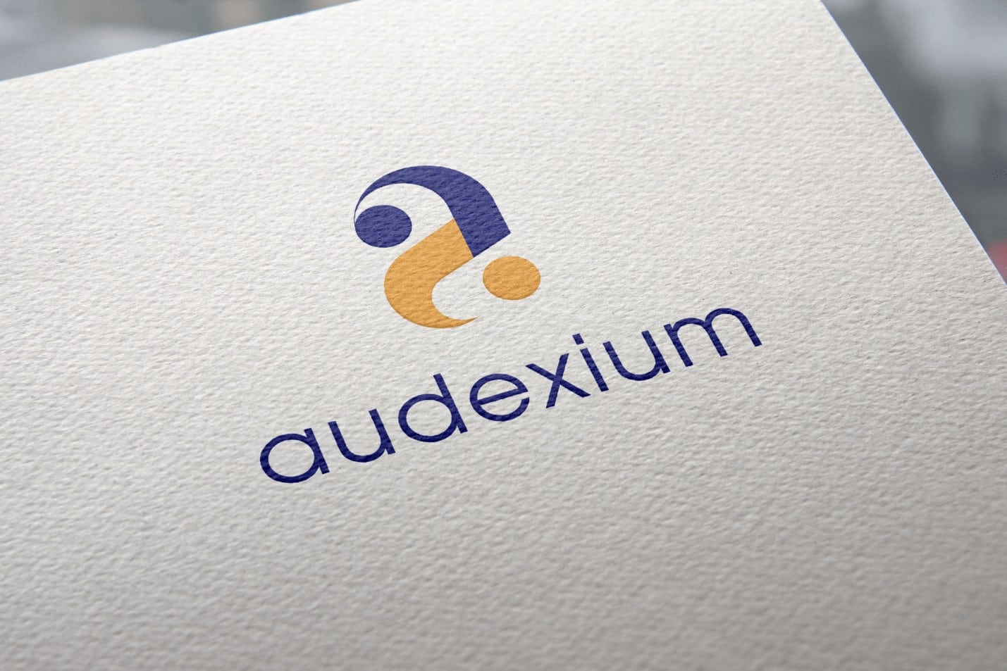 Audexium, mock up logo sur du papier